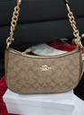Cartera Coach para mujer.