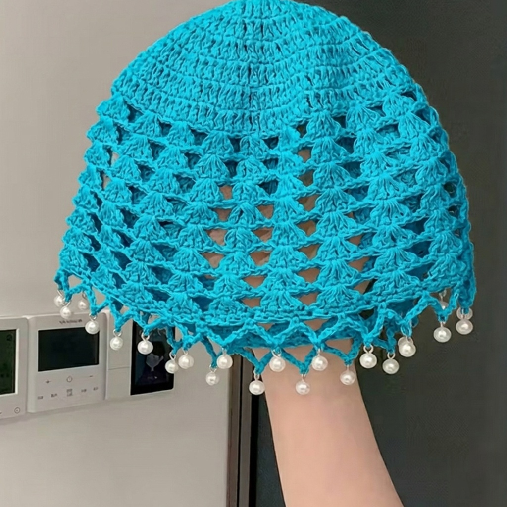 Casquete con perlas alrededor del borde