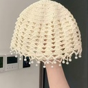 Casquete con perlas alrededor del borde