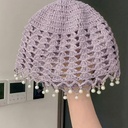 Casquete con perlas alrededor del borde