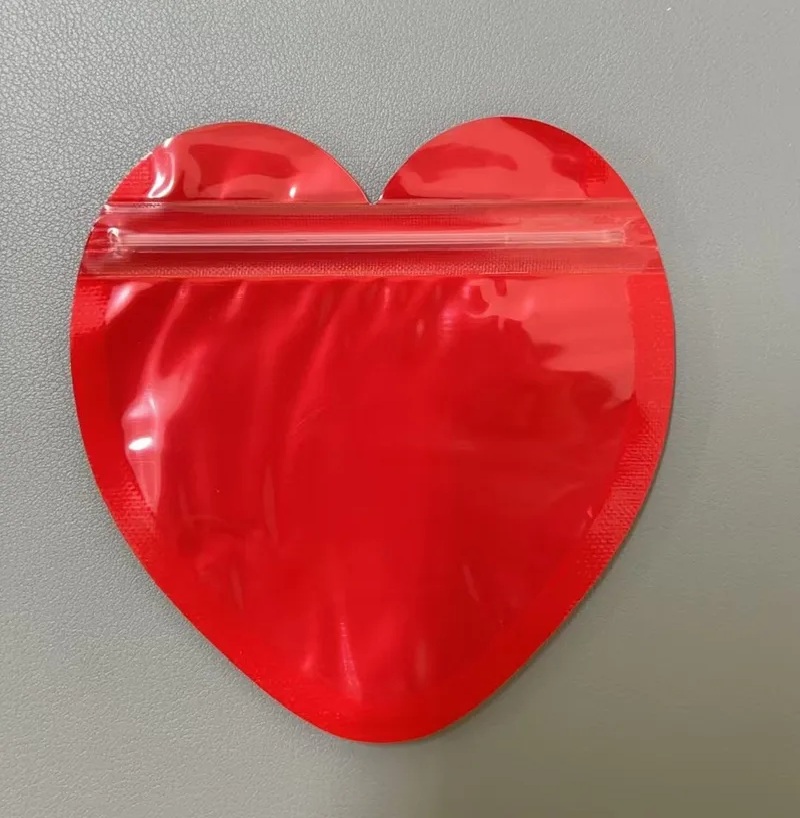 PVC Forma De Corazón Color Sólido Bolsa De Joyería 10x10