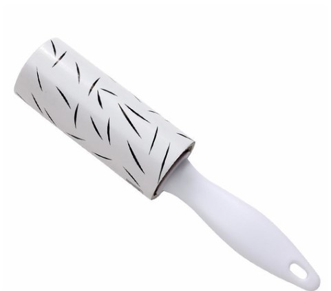 Rodillo quitapelusas, el papel adhesivo está diseñado para recoger pequeñas fibras.