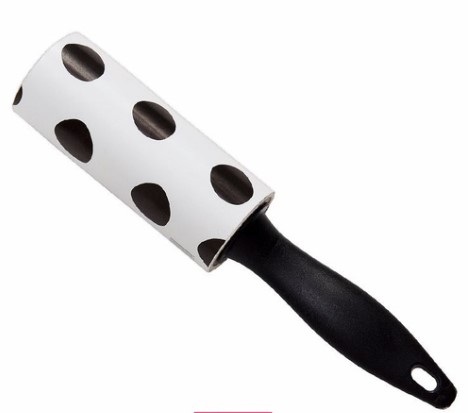 Rodillo quitapelusas, el papel adhesivo está diseñado para recoger pequeñas fibras.