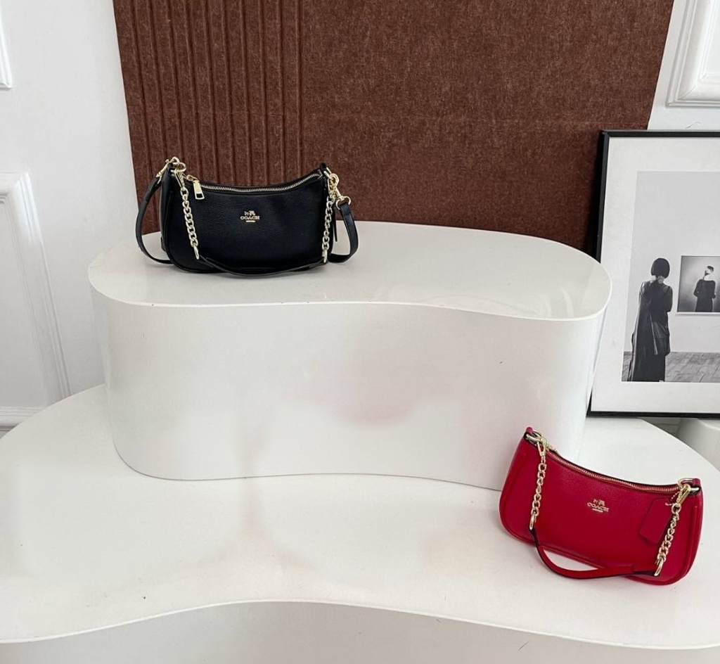 Cartera Coach para mujer.