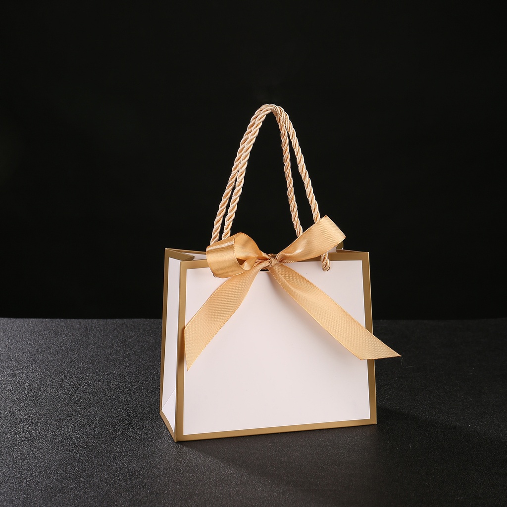 Bolsa de regalo de cartón (14X6X12) BLANCO (LAZO COLOR NUDE)