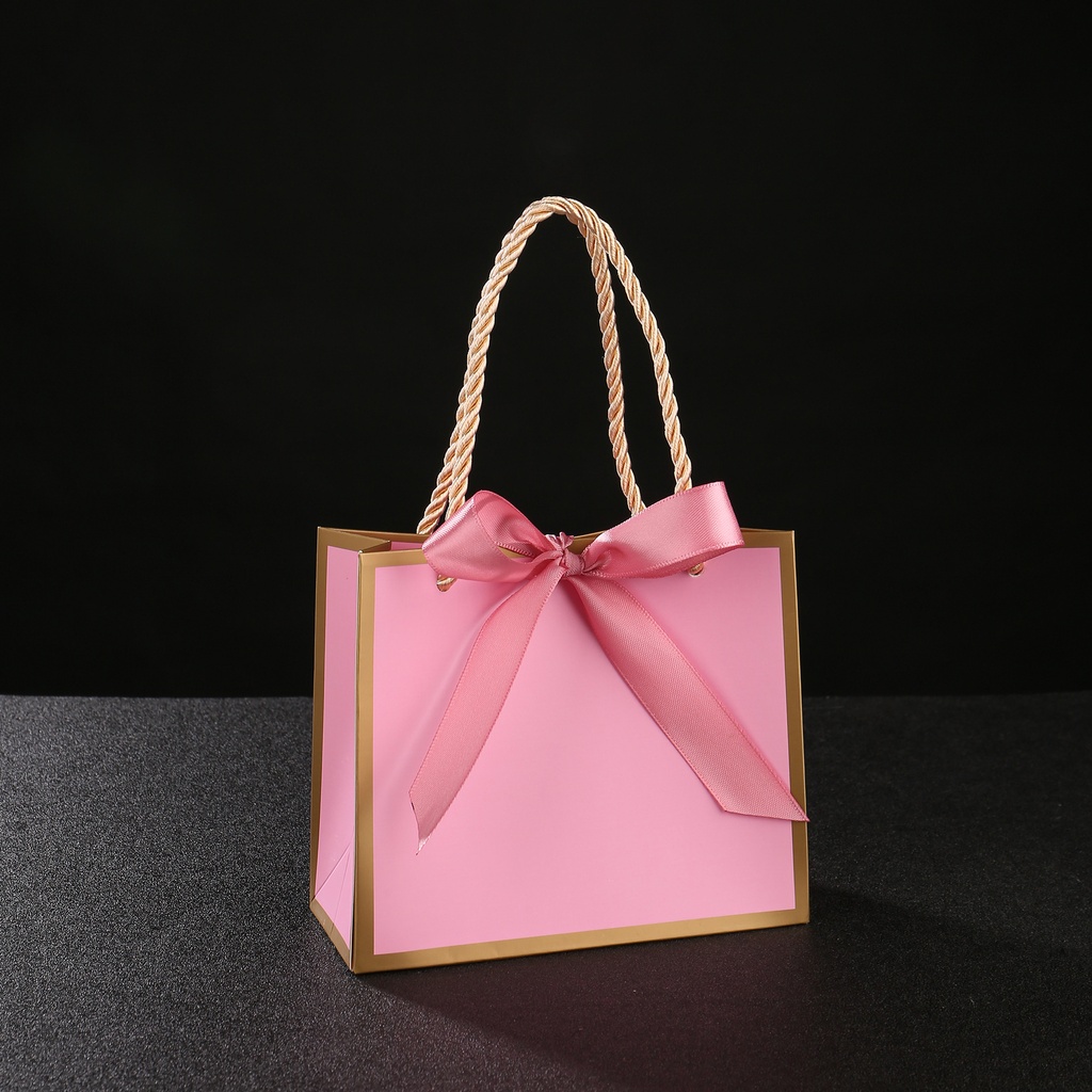 Bolsa de regalo de cartón con lazo rosado 14X6X12cm